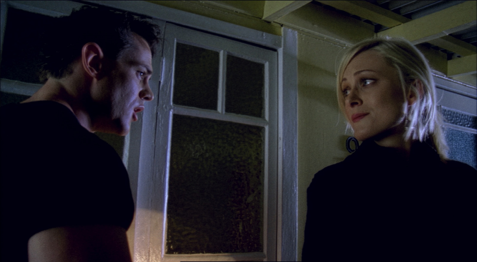 Two characters on a balcony, from Unfinished Business